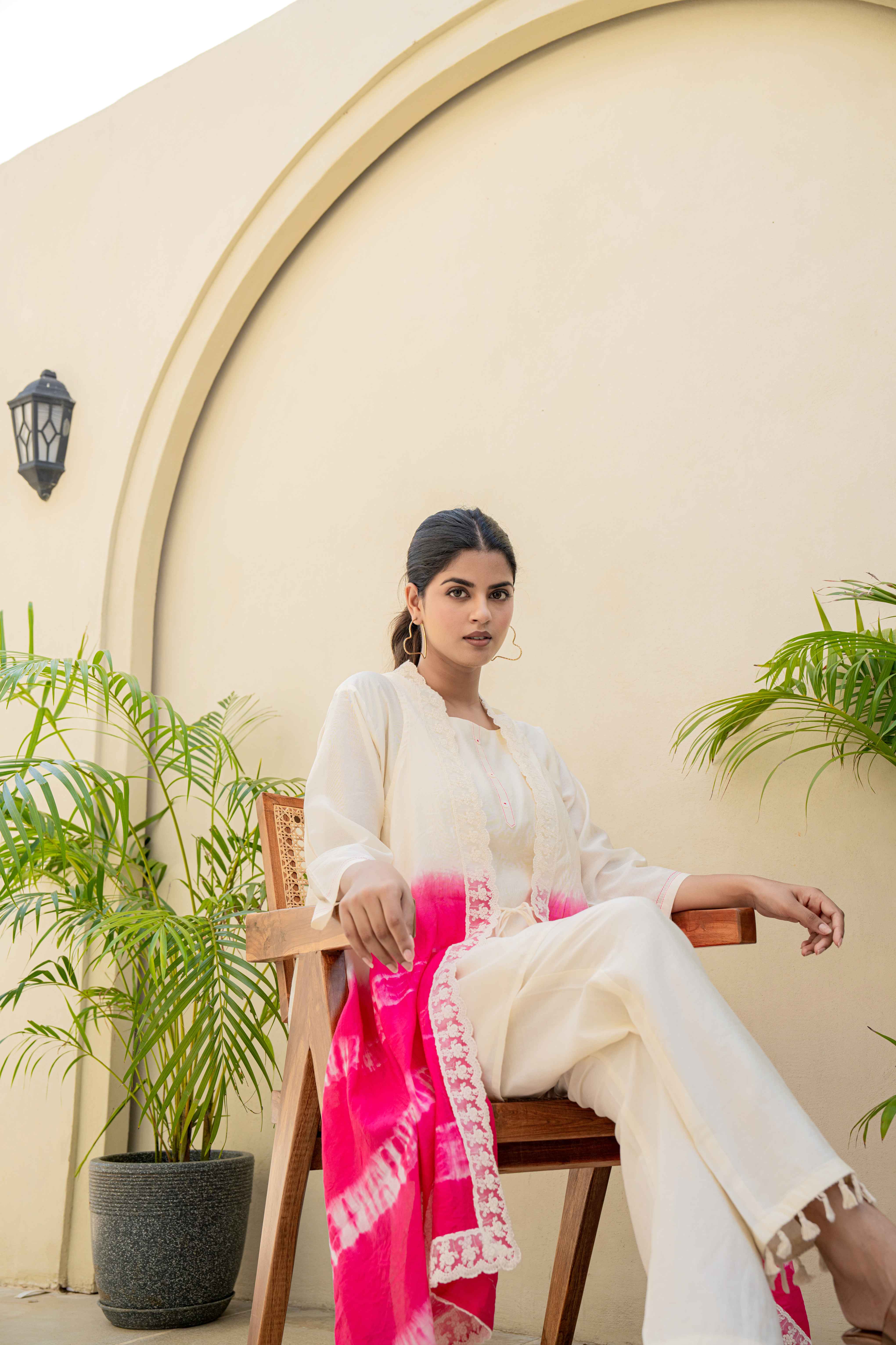 Elegant Ivory and Pink Ombre Kurti Set with Lace Detailing sitting view

